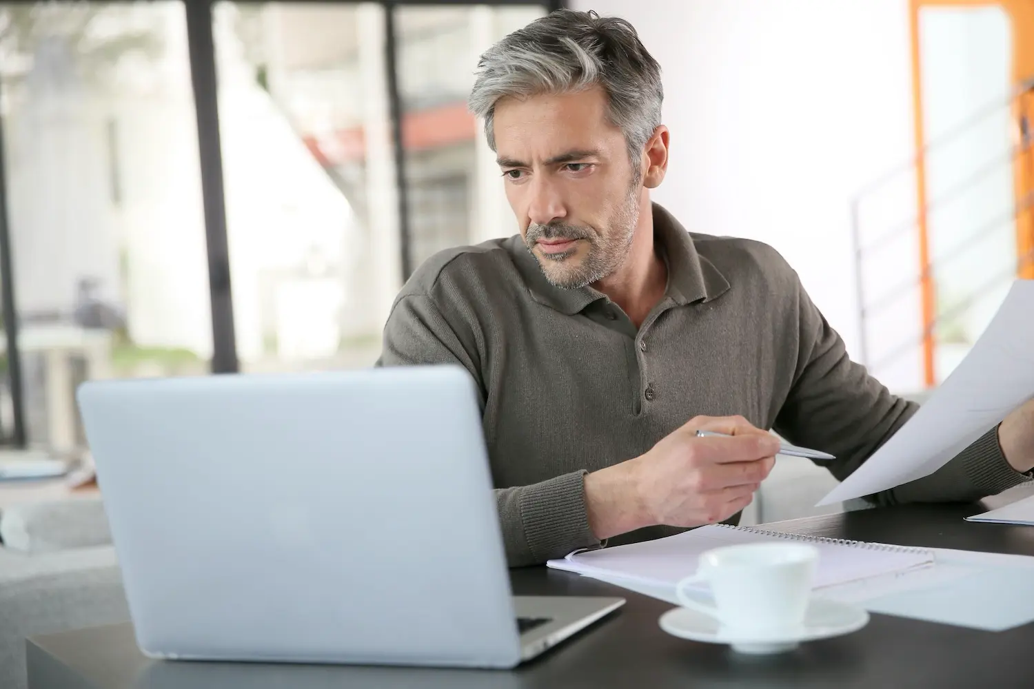 How To Calculate Cost of Goods Sold (and Why It Matters) 3 A business owner calculates his cost of goods sold