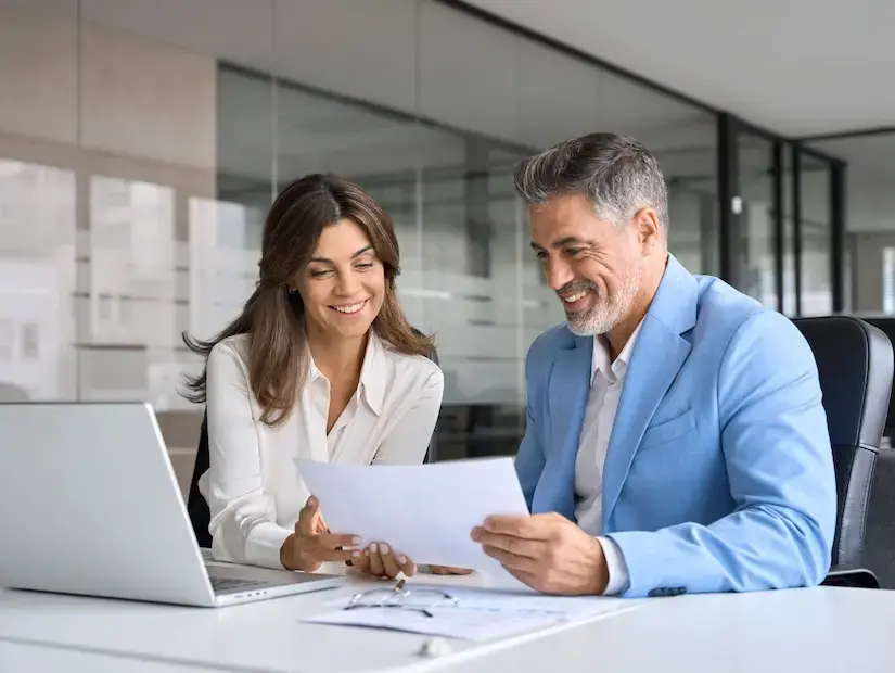 A recruiter reviews CFO candidates with her client