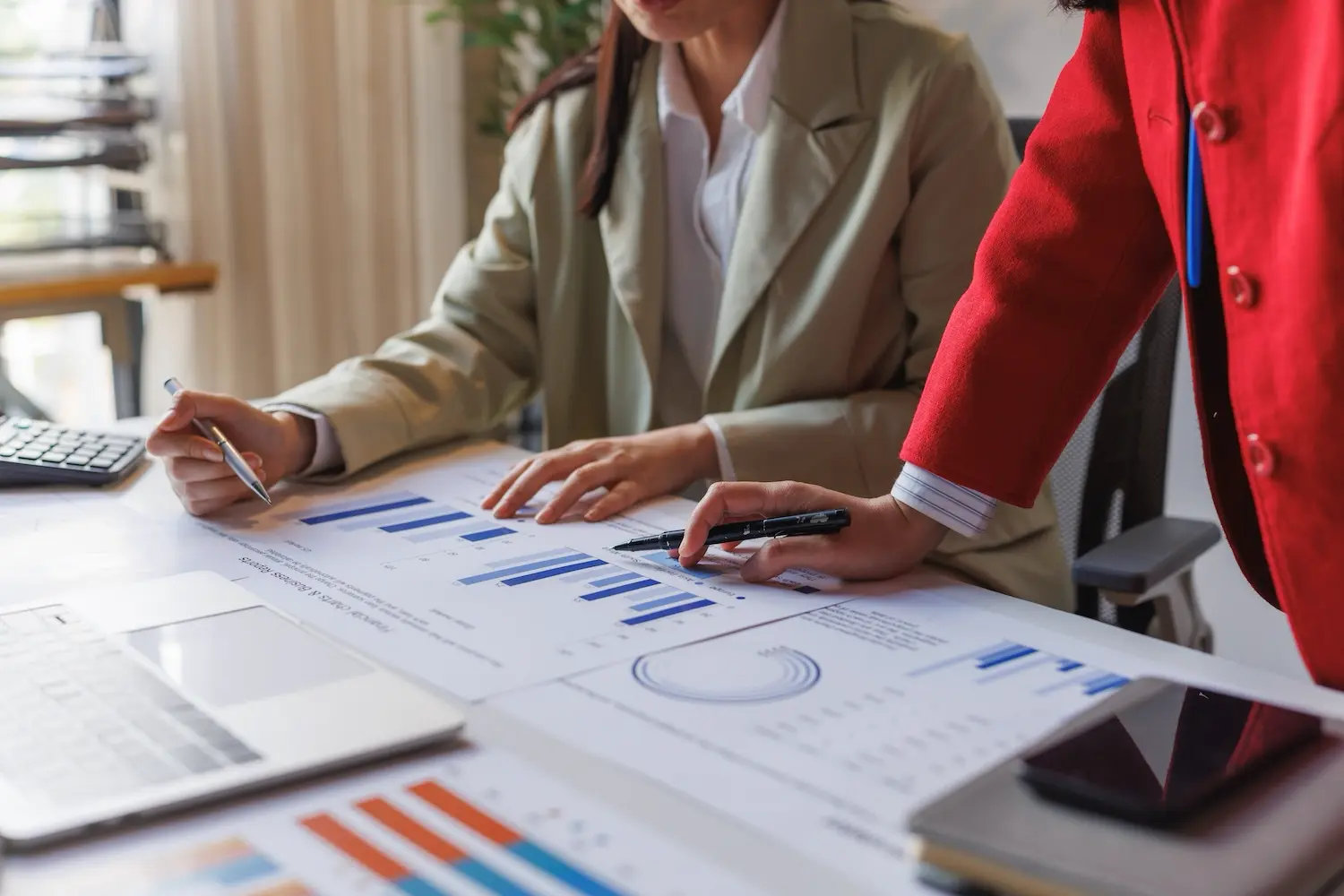 An FP&A team reviews a financial report.